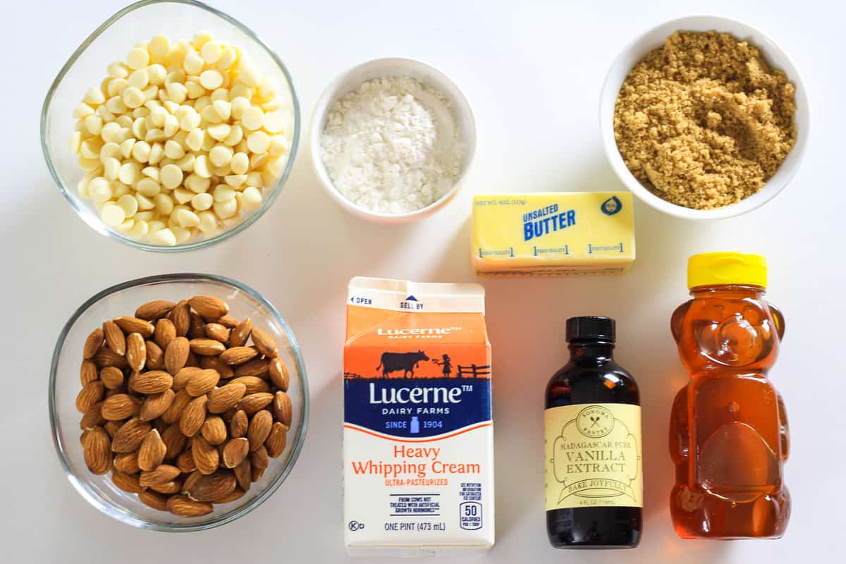 Florentine Cookies are the perfect delicate balance of crunchy sweetness that melts in your mouth. This simple recipe will become a favorite. #Florentinecookies #lacecookies #almondcookies #thincooking #Florentines ingredients for florentine cookies laying on as flat white surface and photographed from overhead