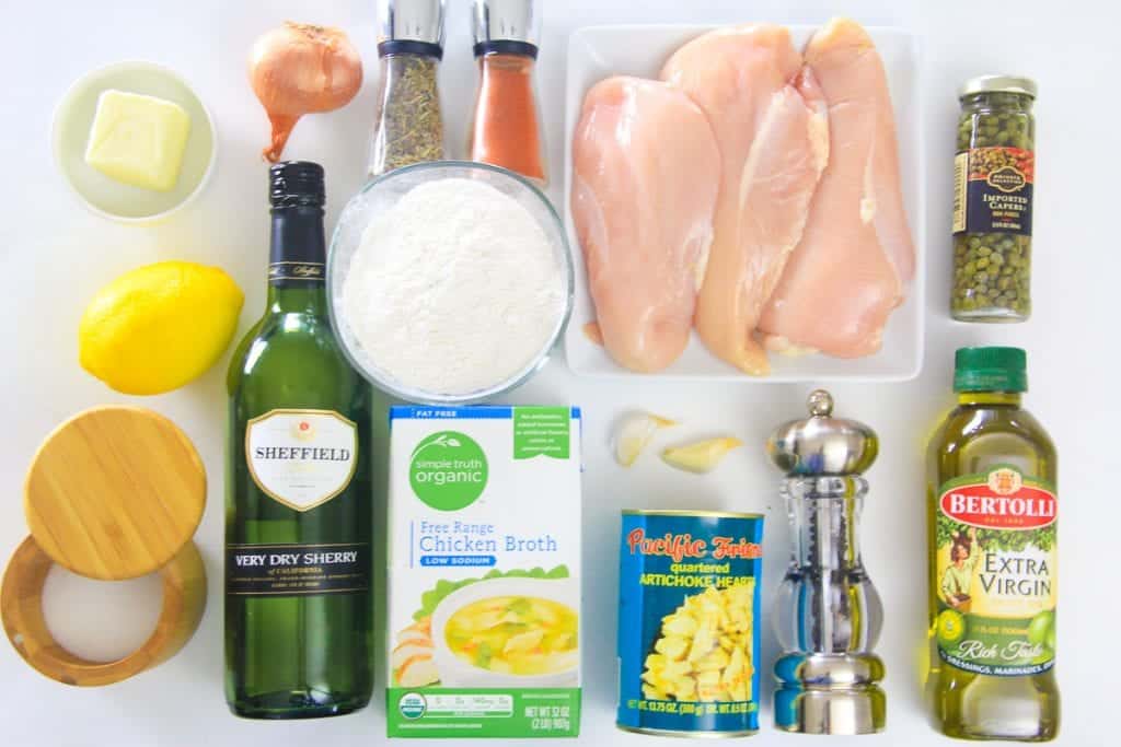 ingredients for chicken piccata: white wine, butter, lemon, shallots, garlic, flour, chicken broth, salt, paprika, black pepper, chicken breasts, capers, olive oil, and artichoke hearts.