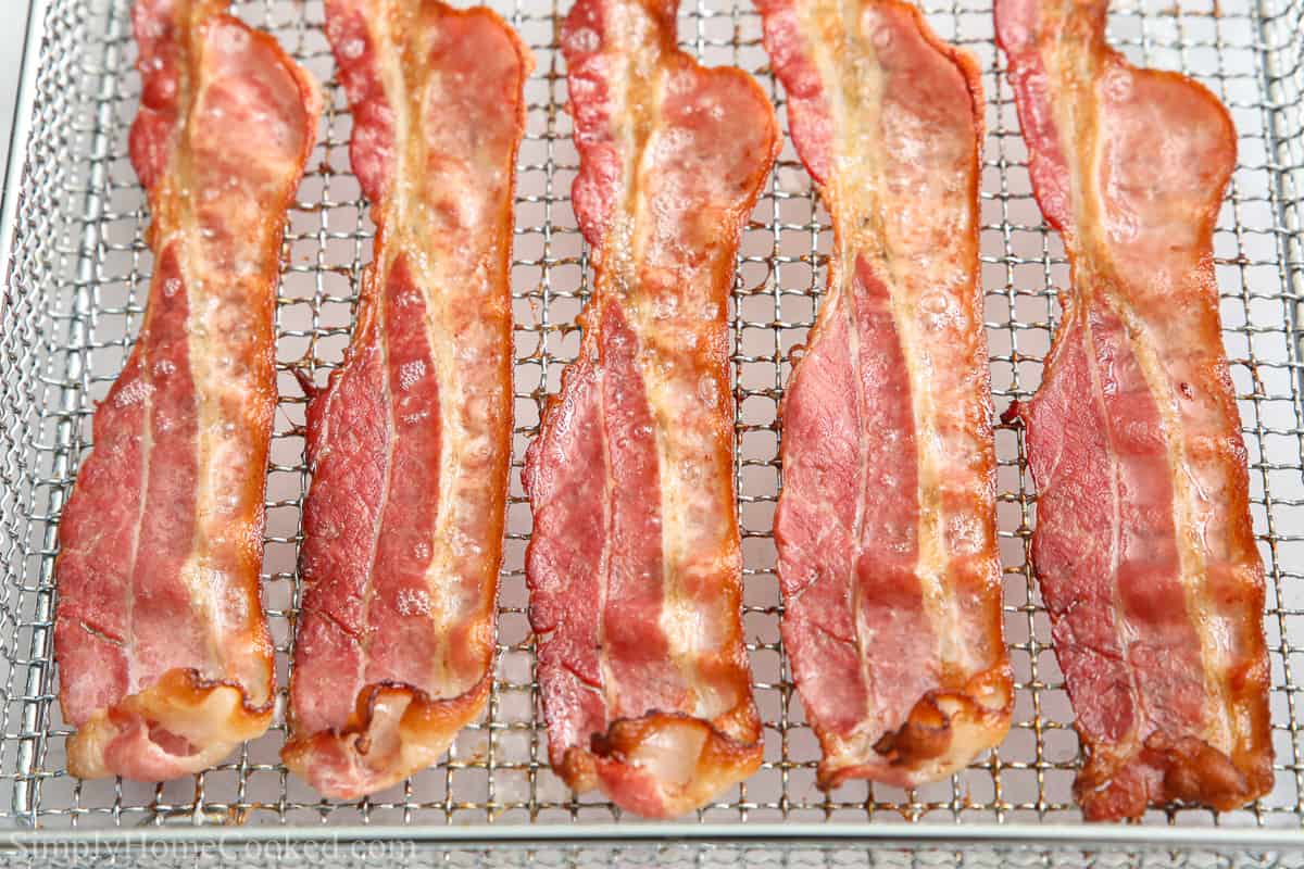 Close up image of crispy cooked on an air fryer wire rack.