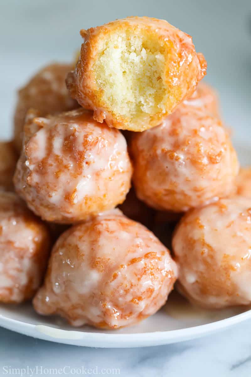 Tower of glazed Homemade Donut Holes.