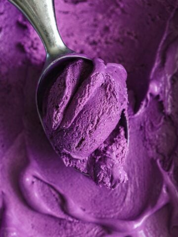 Ube Ice Cream and an ice cream scooper.