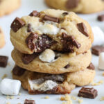 Square image of S'mores Cookies stacked with a bite missing