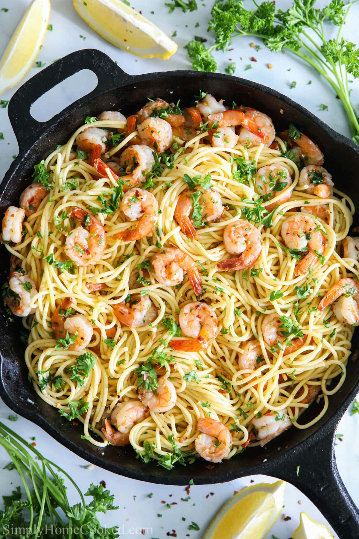 Vertical image of Shrimp Scampi Pasta in a skillet.