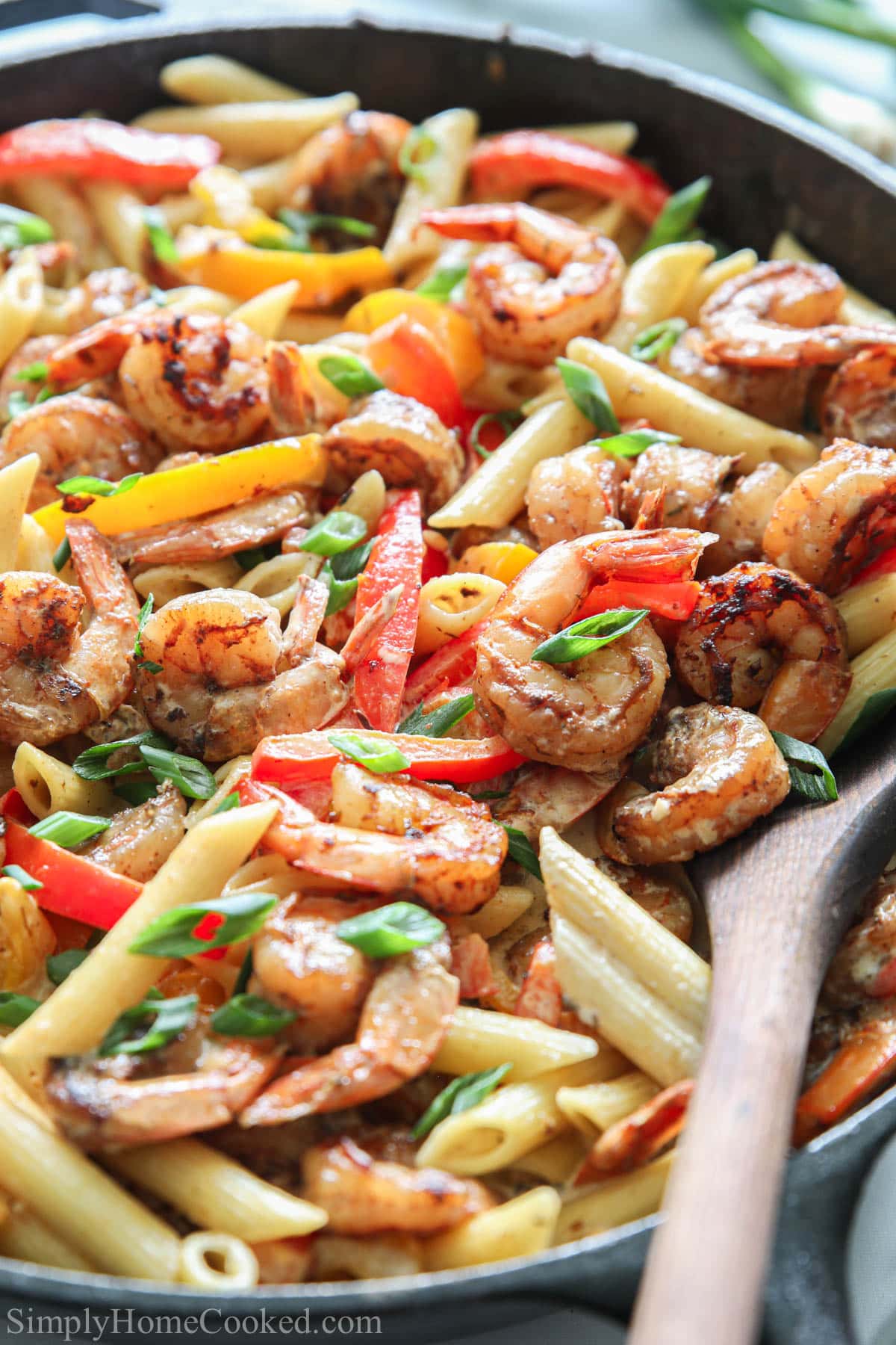close up image of shrimp rasta pasta in a pan