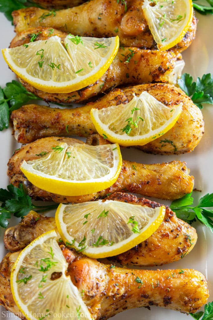 Vertical image of Baked Chicken Drumsticks lined up