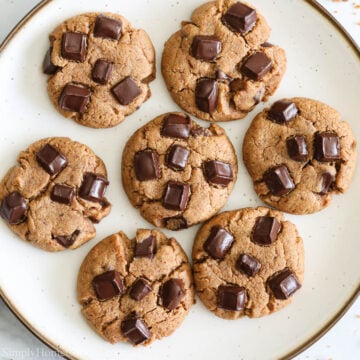 overhead image of coconut flour cookies on a white plate