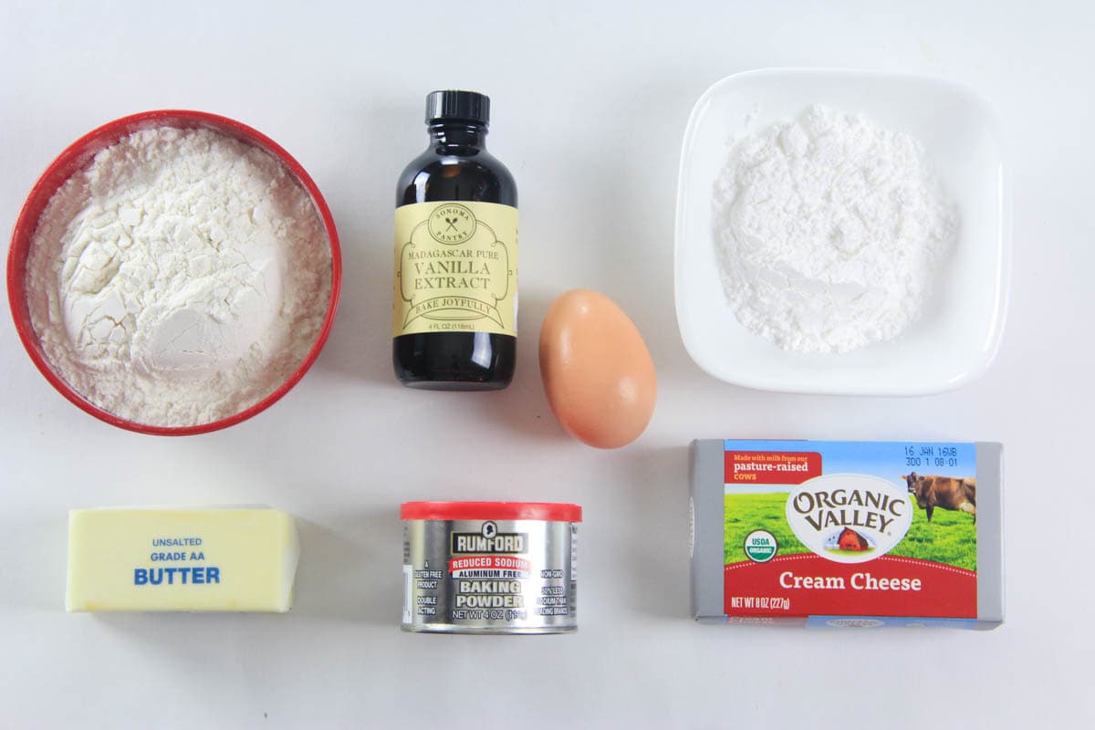 Ingredients for Pear Tart, including cream cheese, vanilla, egg, flour, sugar, butter, and baking powder