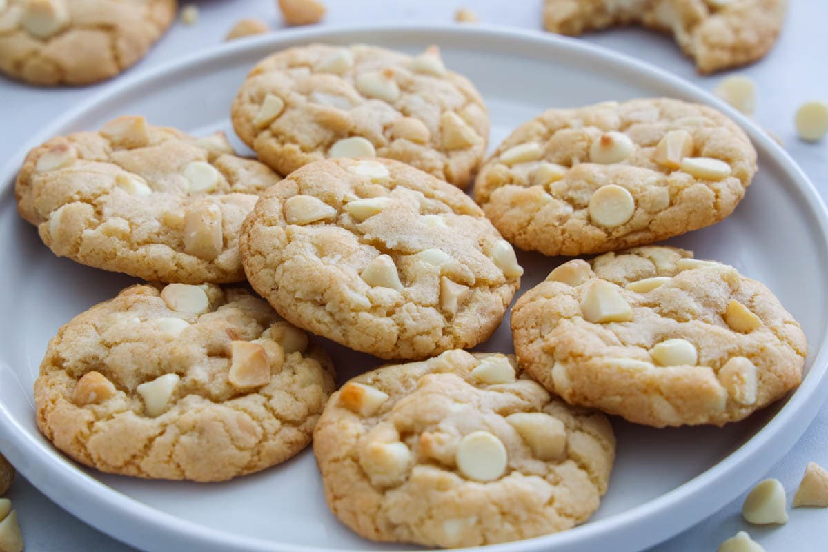 Horizontal image of plate of White Chocolate Macadamia Nut Cookies.