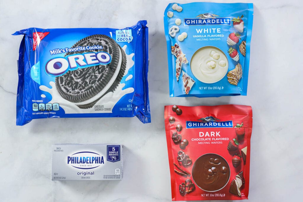 Ingredients for Oreo truffles: Oreos, cream cheese, and candy melts.