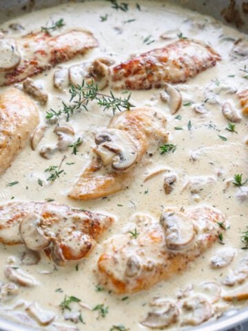 Cream of Mushroom Chicken in a pan.