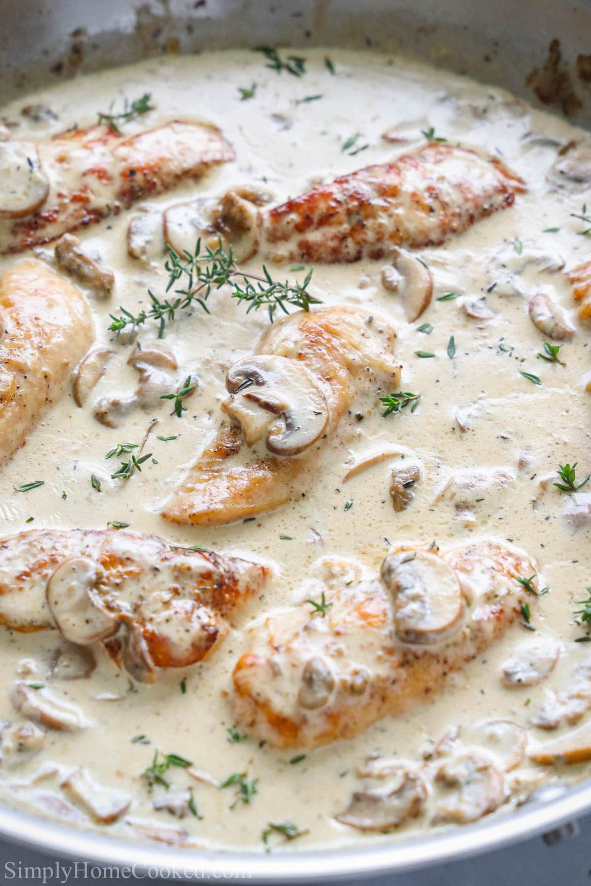 Cream of Mushroom Chicken in a pan.