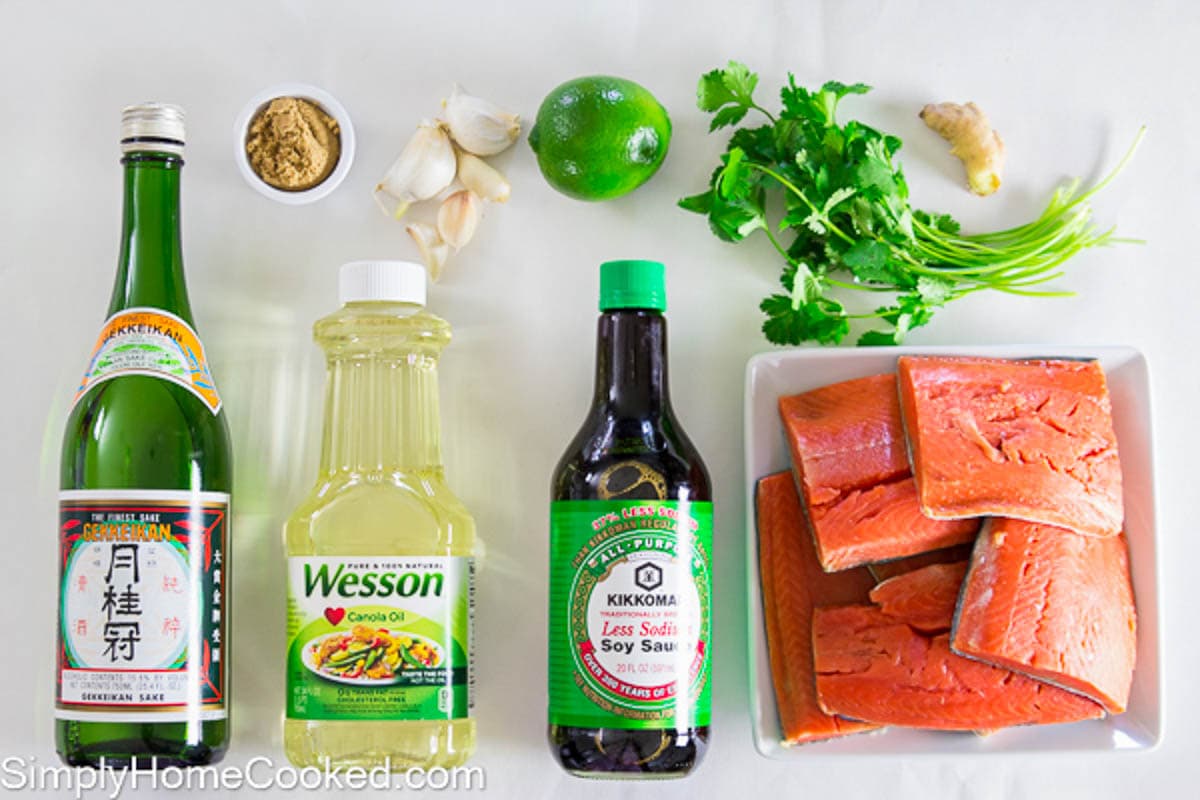 Ingredients for Cilantro Lime Salmon, including salmon fillets, rice wine, soy sauce, oil, cilantro, lime, brown sugar, ginger, and garlic.