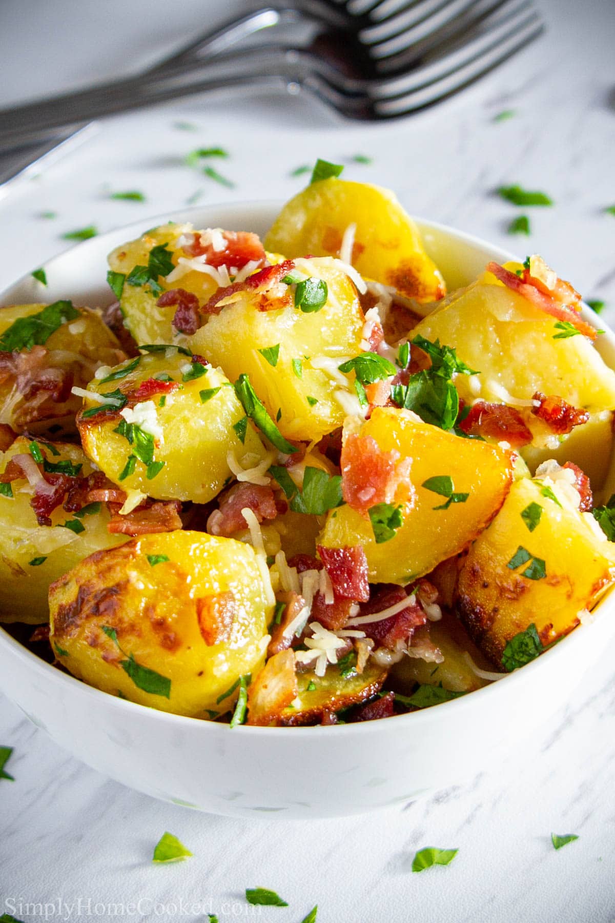 Close up of a bowl of Parmesan Roasted Potatoes