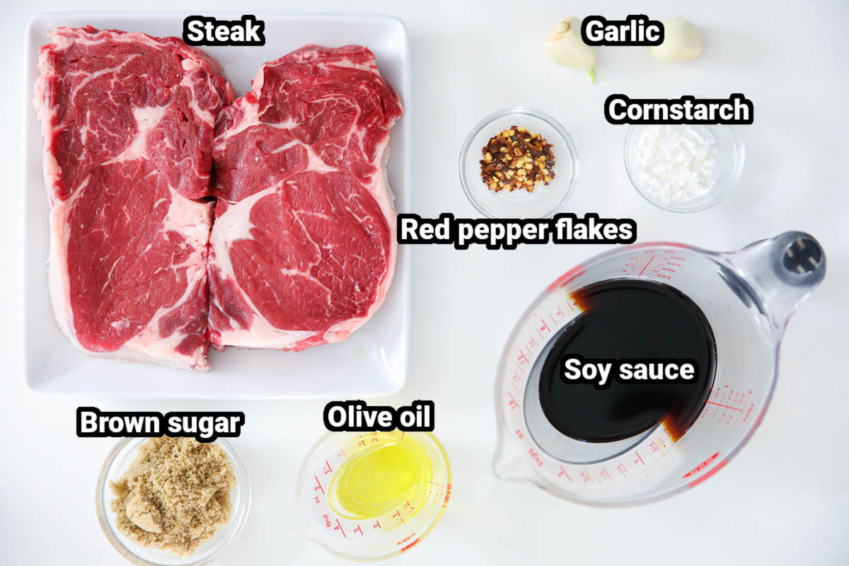 These Air fryer steak bites are so savory and juicy. Your whole family with love their delicious flavors and great texture. #beststeakbites #airfryerdinnerrecipe #steakbitedinner #airfryersteakbitesdinnerrecipe Ingredients for Air Fryer Steak Bites: steak, brown sugar, olive oil, soy sauce, red pepper flakes, garlic, and cornstarch.