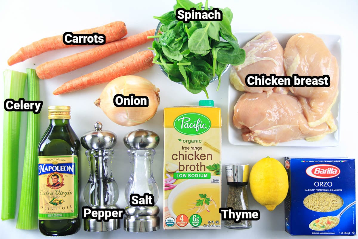 Ingredients for Lemon Chicken Orzo Soup: chicken breast, spinach, carrots, celery, onion, olive oil, salt, black pepper, chicken broth, thyme, lemon, and orzo.