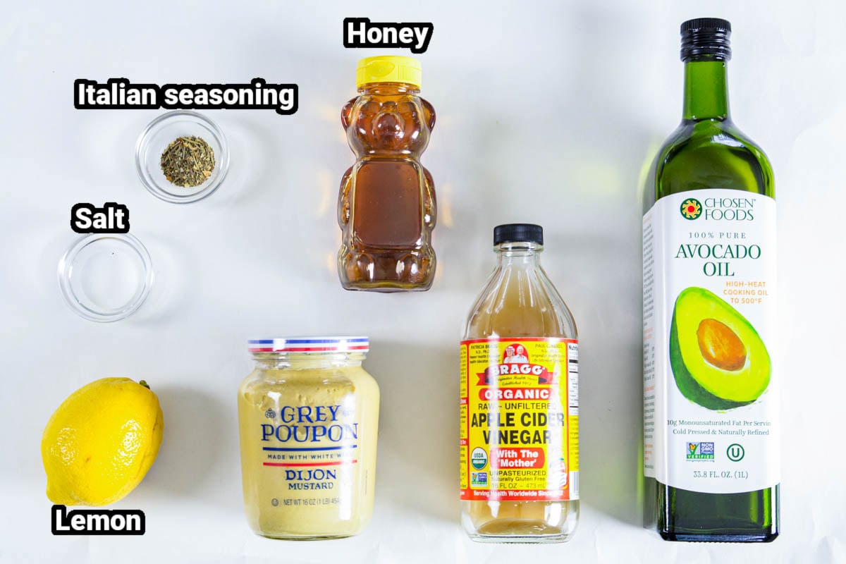 Ingredients for Spinach Salad dressing: avocado oil, apple cider vinegar, dijon mustard, honey, lemon juice, italian seasoning, and salt