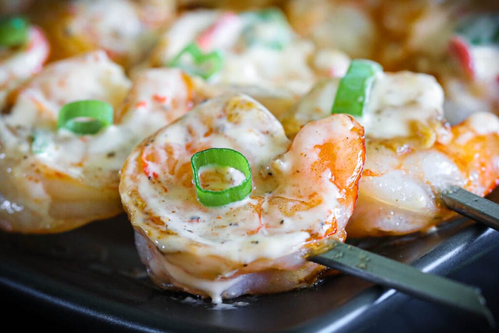 Grilled Bang Bang Shrimp on skewers.