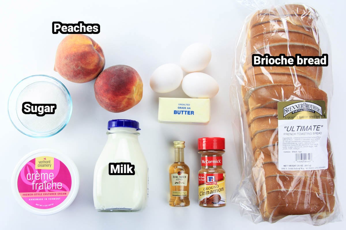 Ingredients for Peach French Toast: brioche bread, eggs, butter, cinnamon, sugar, rum, milk, peaches, and creme fraiche. 