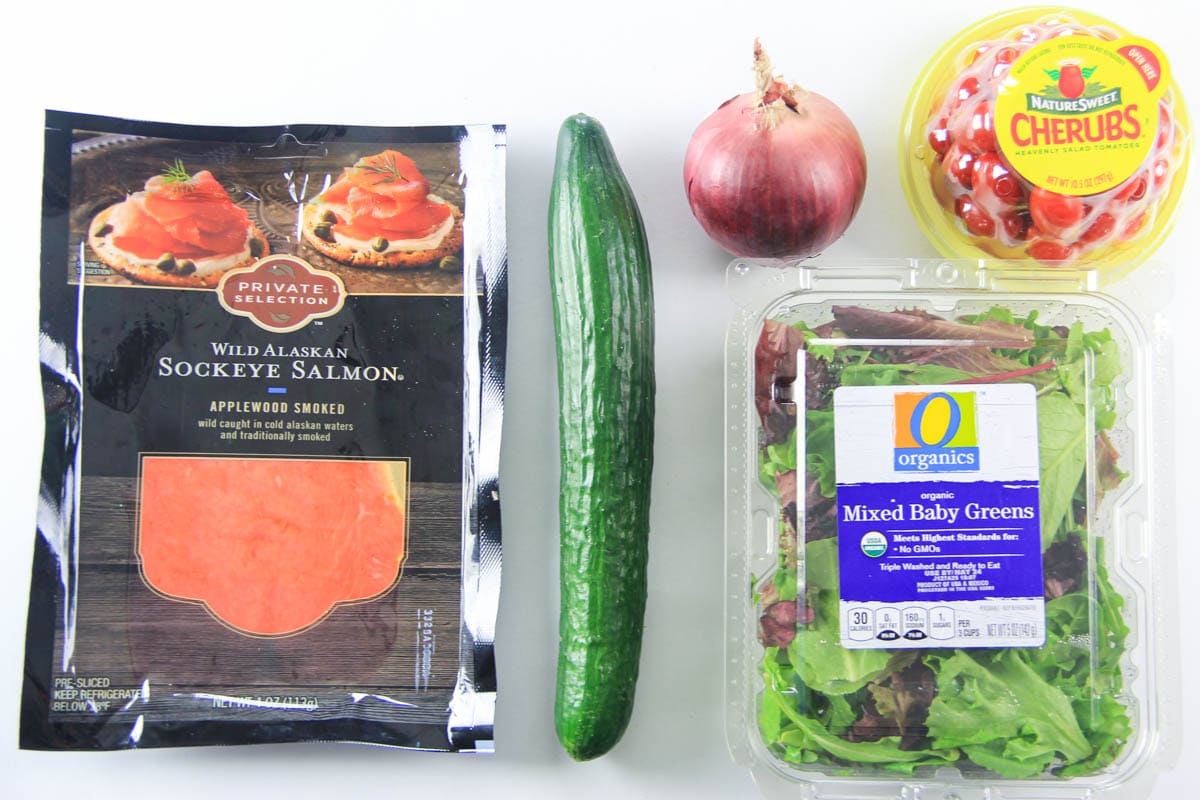 Ingredients for Smoked Salmon Salad; smoked salmon, English cucumber, red onion, cherry tomatoes, and mixed baby greens.