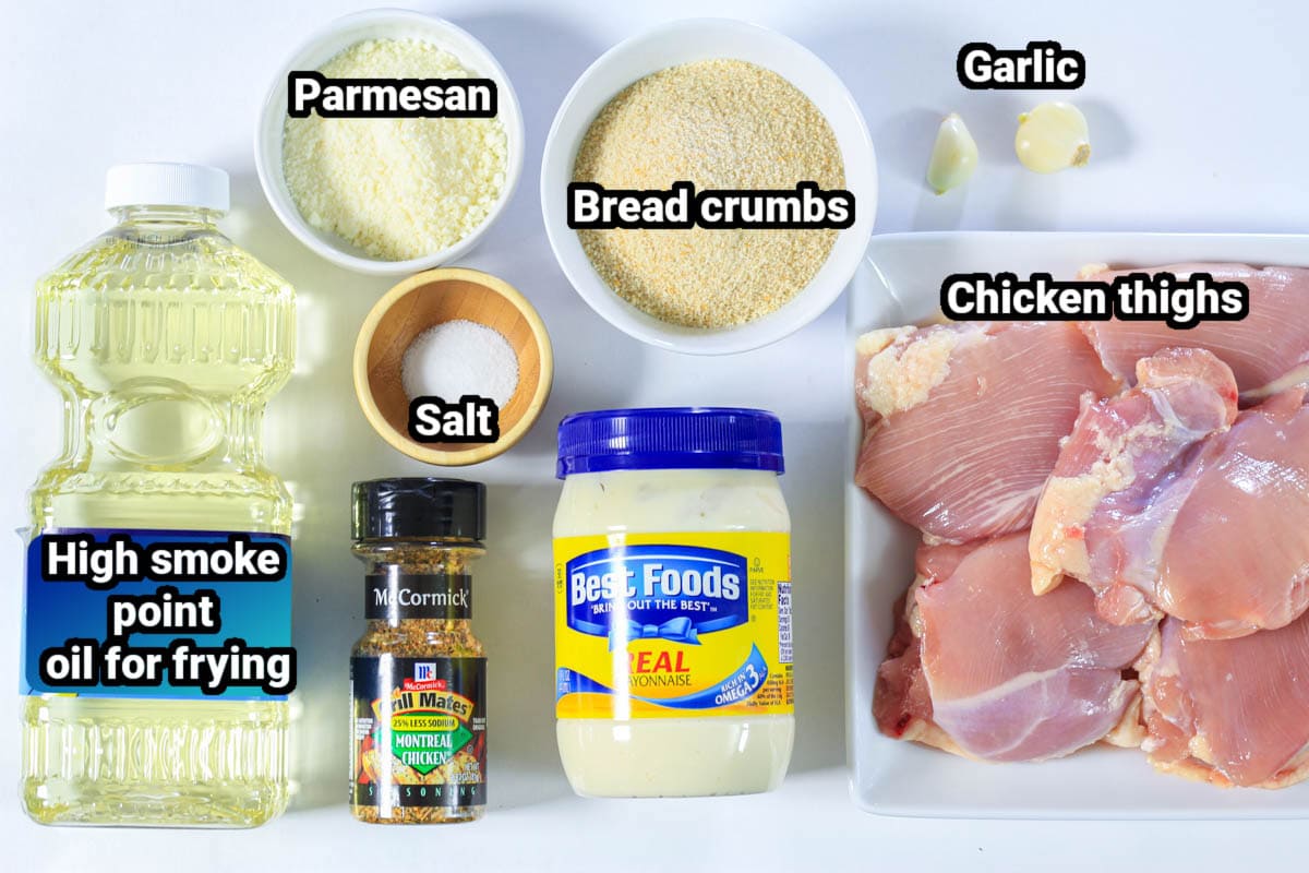 Ingredients for Breaded Chicken Skewers: chicken thighs, garlic cloves, breadcrumbs, mayo, Parmesan cheese, salt, Montreal Chicken seasoning, and oil.