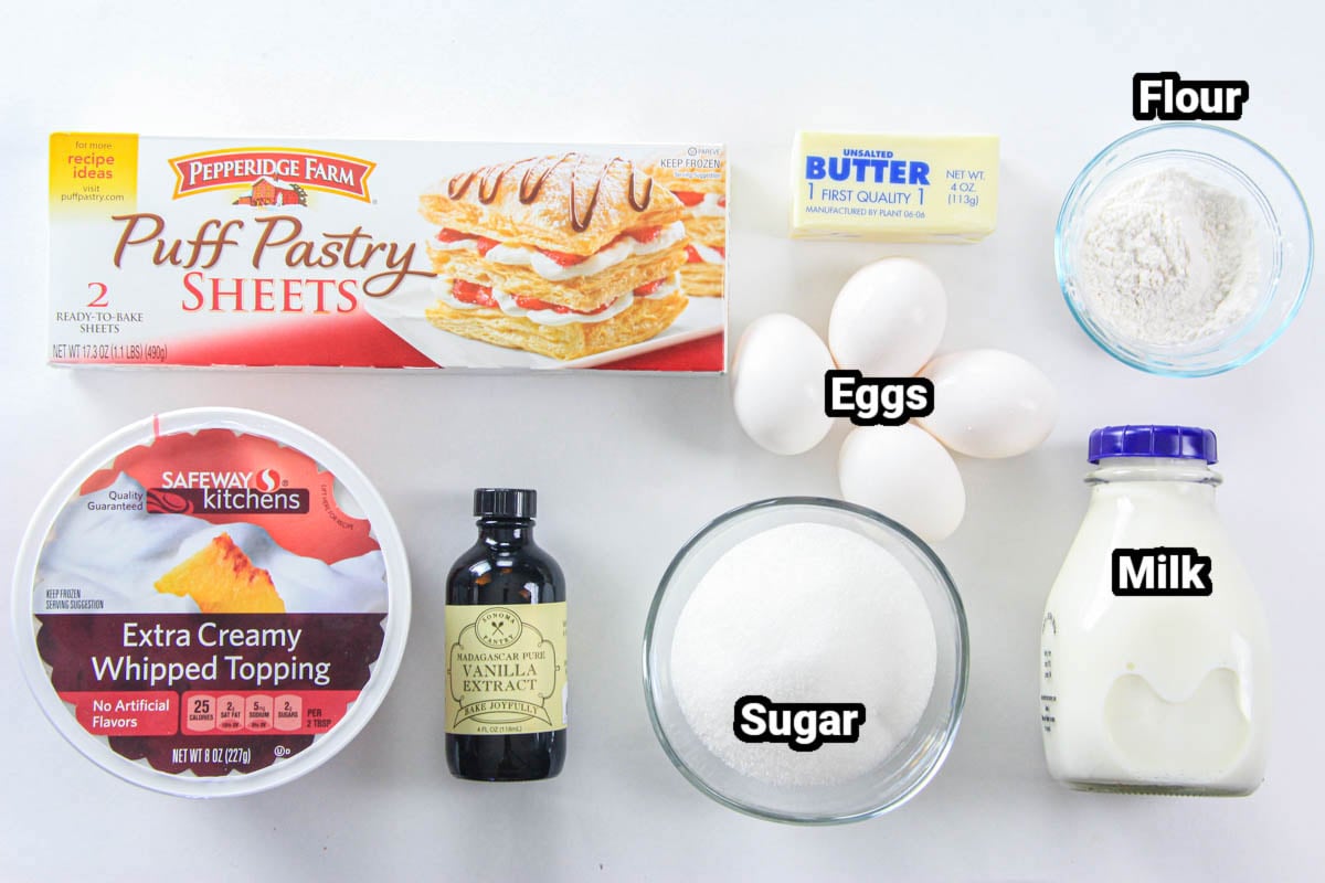 Ingredients for Easy Napoleon Cake: puff pastry sheets, whipped topping, vanilla, sugar eggs, butter, flour, and milk.