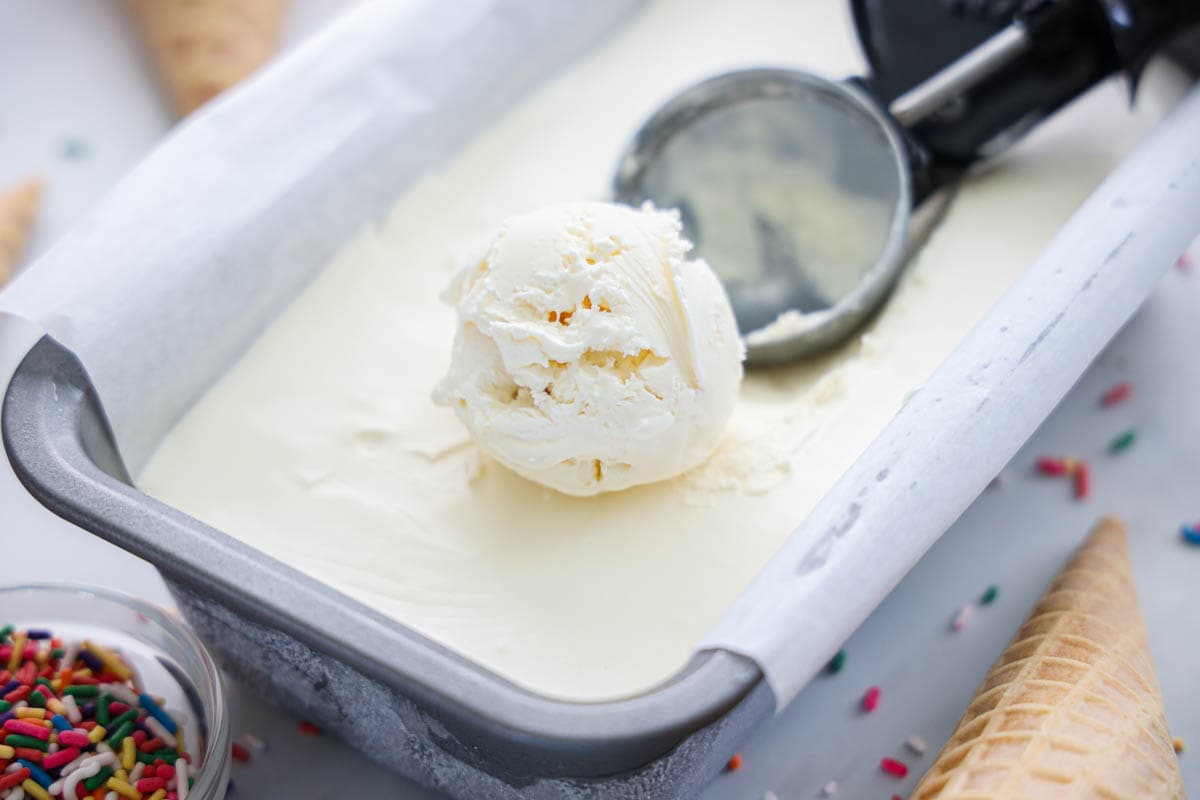An ice cream scooper copping out some No Churn Ice Cream.