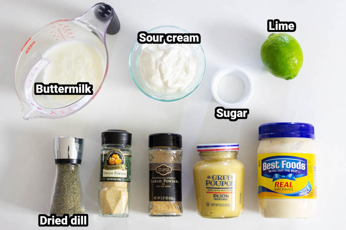 Ingredients for Buttermilk Ranch: buttermilk, sour cream, lime, sugar, mayo, dijon mustard, garlic powder, onion powder, and dried dill.