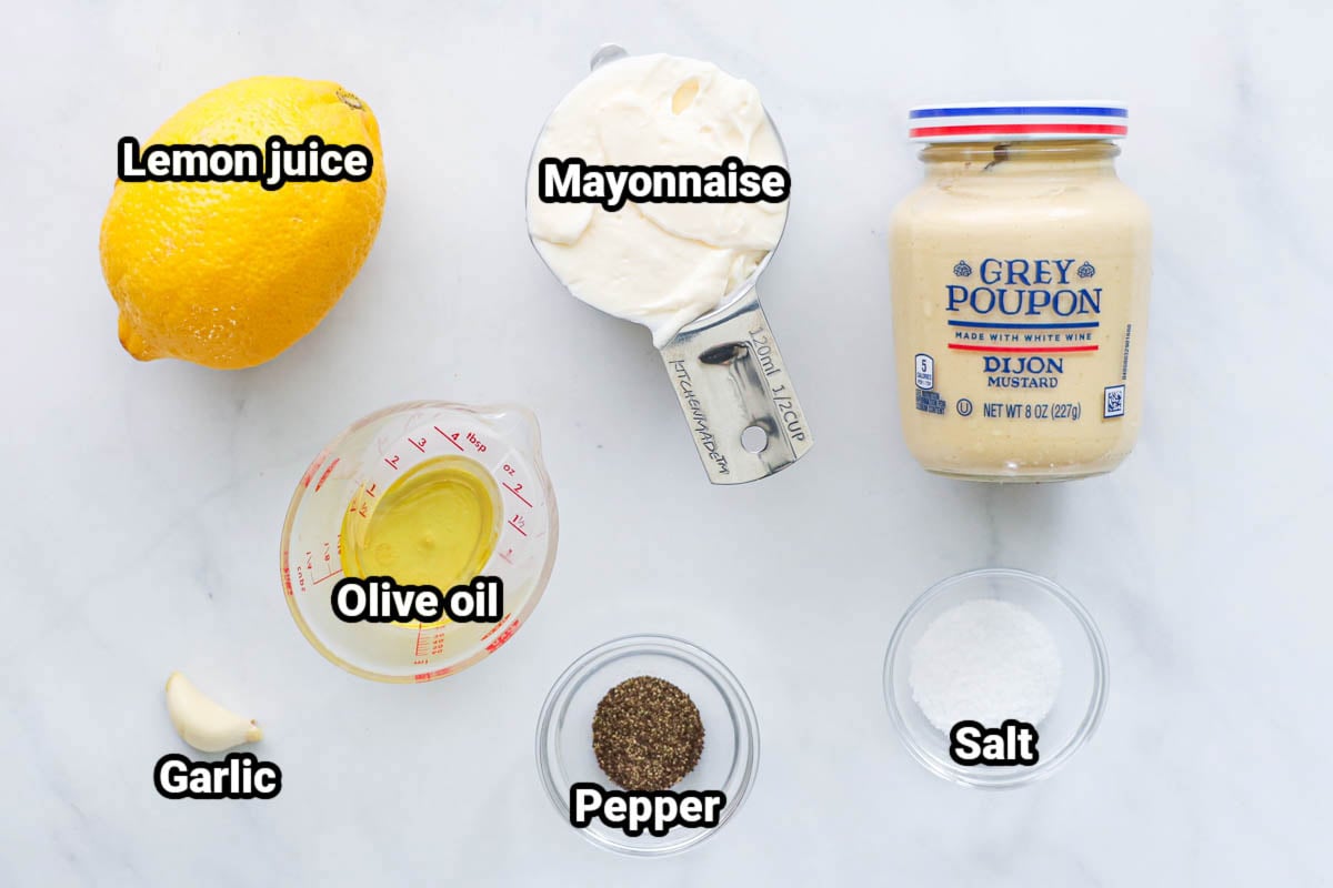 Ingredients for Garlic Aioli: lemon juice, mayonnaise, Dijon mustard, olive oil, garlic cloves, salt, and black pepper.