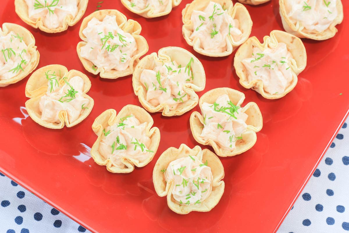 Smoked Salmon Appetizer Cups on a red placemat.