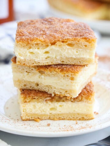 Stack of Sopapilla Cheesecake bars.