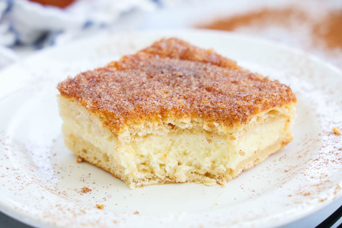 Sopapilla Cheesecake missing a bite.