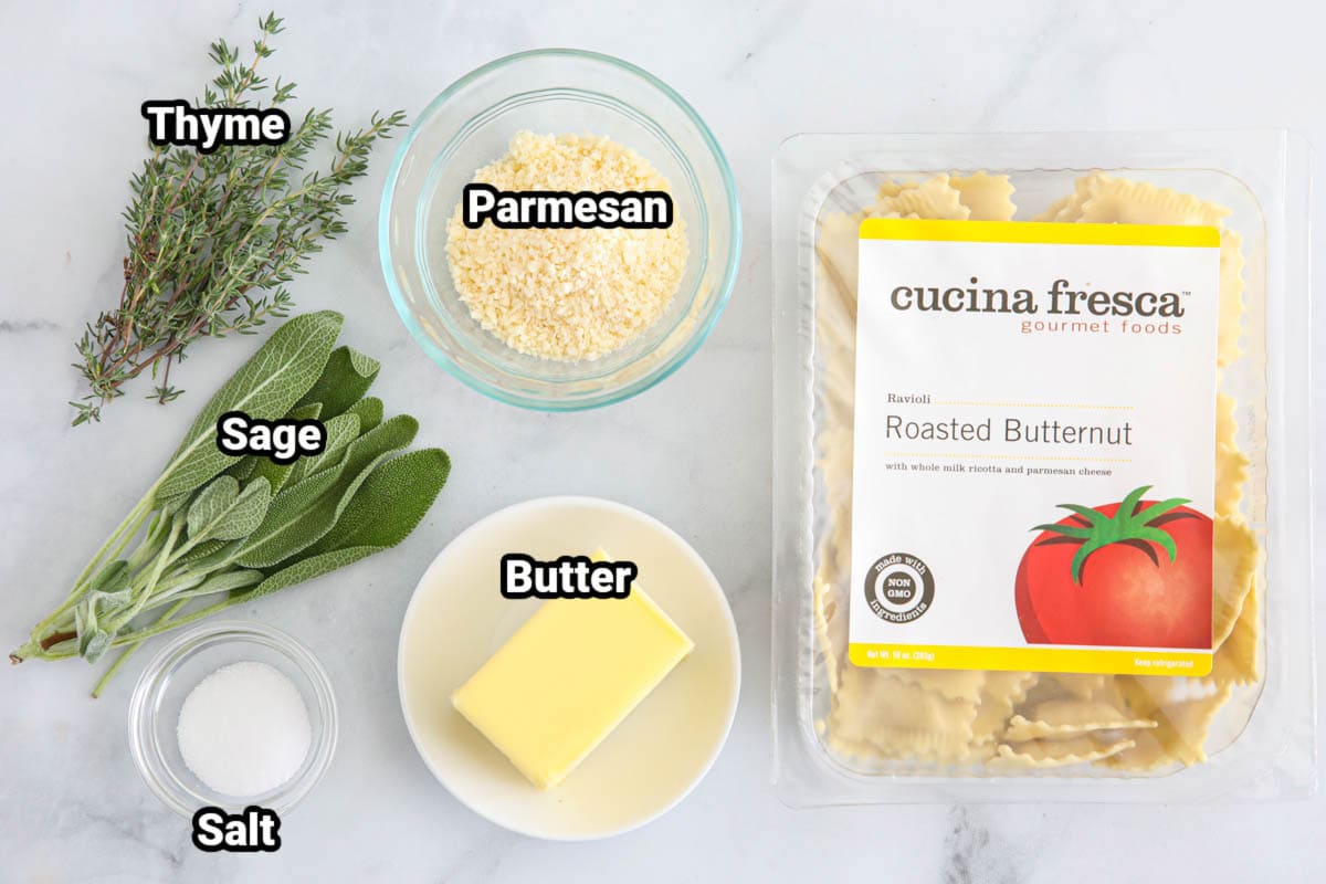 If you like festive fall dishes, then these Butternut Squash Ravioli are going to become a favorite. Made with brown butter and fresh herbs, they are the perfect comfort food. #comfortfood #fallfavorites #homemadebutternutsquashraviolirecipe #bestraviolirecipe Ingredients for Butternut Squash Ravioli: butternut squash ravioli, parmesan, butter, salt, sage, and thyme.