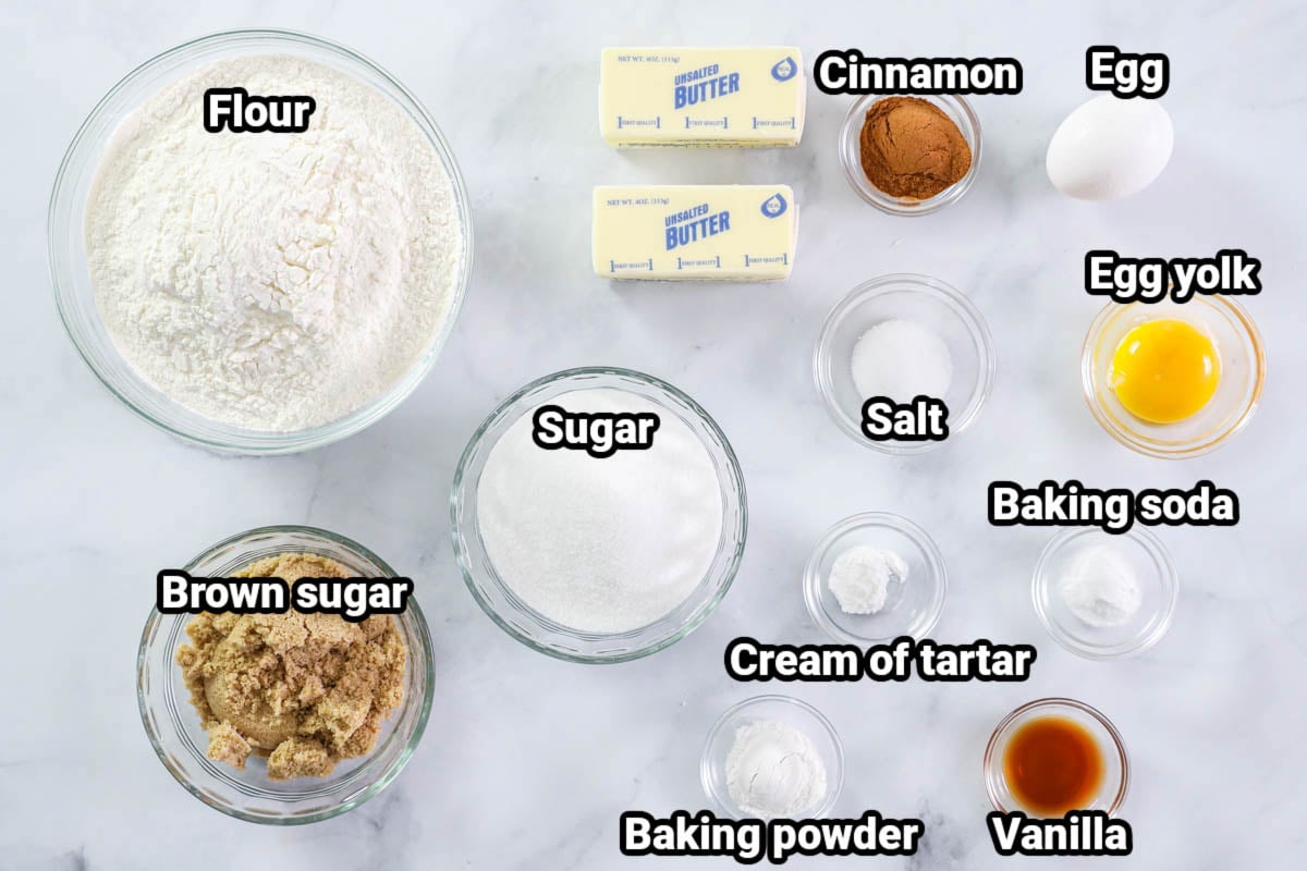 If you love cookies, then these Soft Snickerdoodle Cookies are going to hit the spot. Soft, chewy, a little tangy, and sweet with a cinnamon-sugar mix, they are the best. #bestsnickerdoodles #bestsnickerdoodlecookies #bestsoftsnickerdoodlecookies #bestsoftsnickerdoodles Ingredients for Snickerdoodle Cookies: flour, sugar, brown sugar, butter, cinnamon, egg, egg yolk, salt, baking soda, cream of tartar, baking powder, and vanilla.