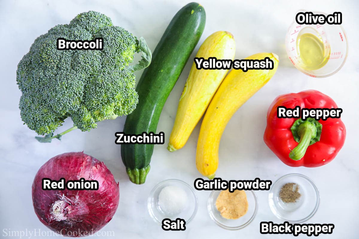 Ingredients for Roasted Air Fryer Vegetables: broccoli, zucchini, yellow squash, red pepper, red onion, olive oil, garlic powder, salt, and black pepper.