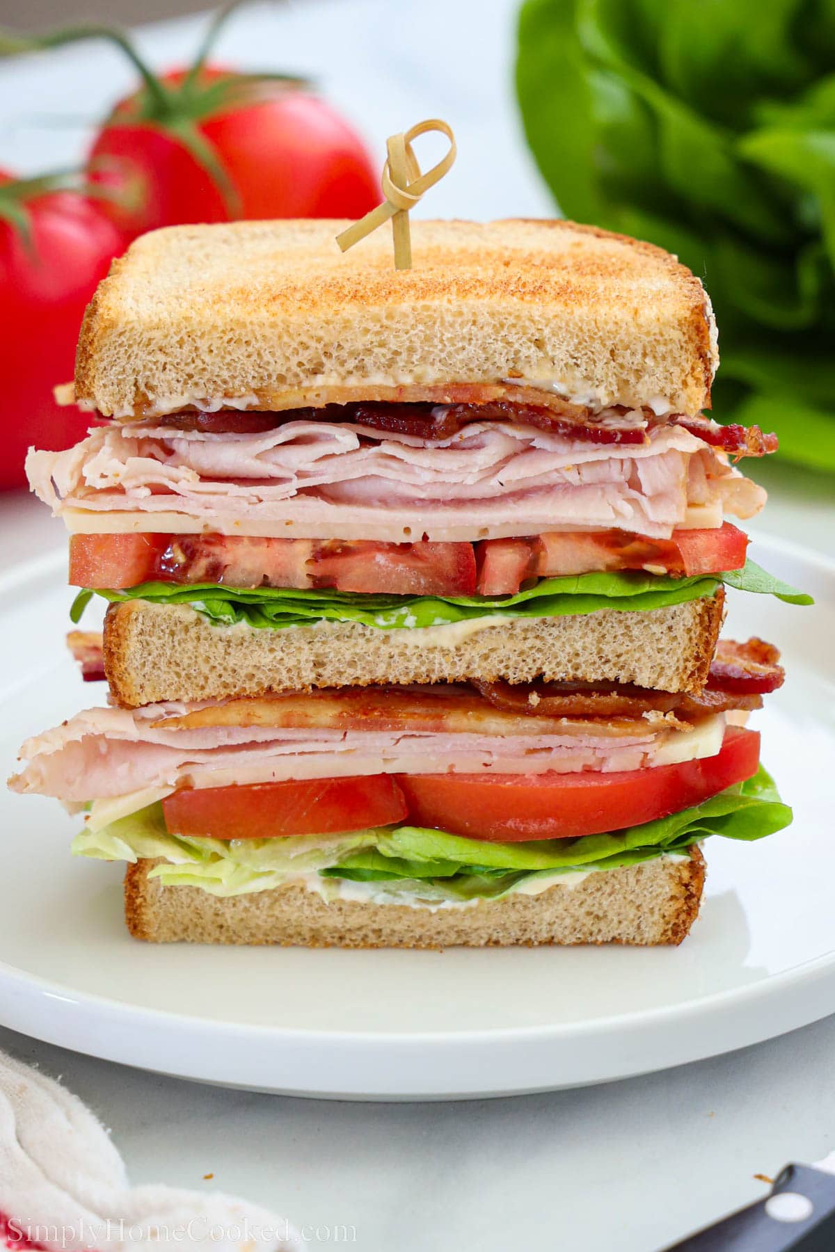 Half of a Turkey Club Sandwich.