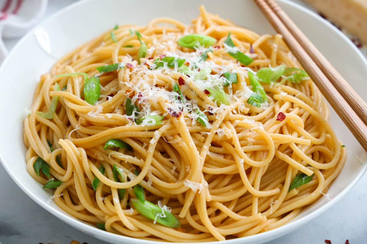 Bowl of Garlic Noodles with chopsticks.