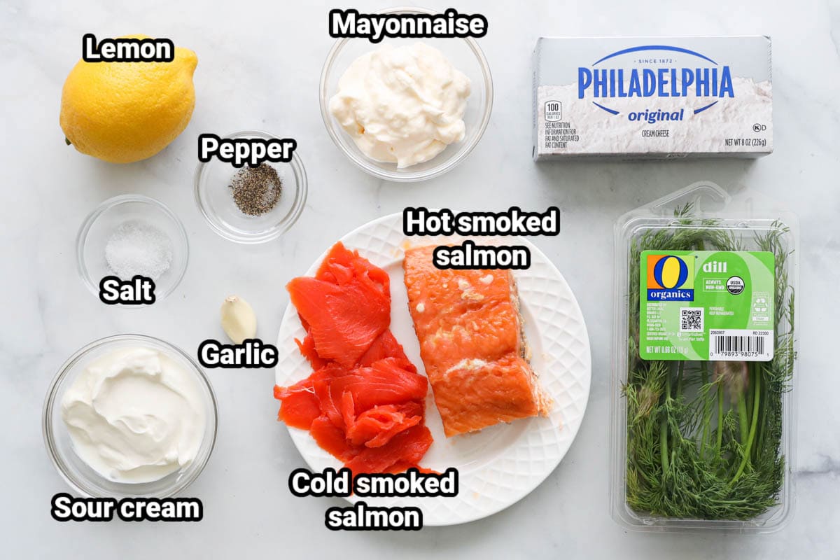Ingredients for Smoked Salmon Salad: hot smoked salmon, cold smoked salmon, fresh dill, cream cheese, lemon, salt, pepper, garlic, sour cream, cream cheese, and mayo.