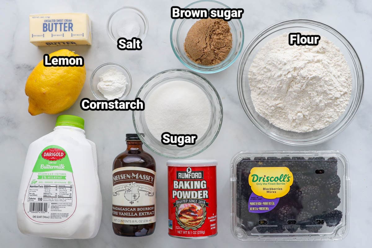 Ingredients for Blackberry Cobbler: butter, lemon, buttermilk, vanilla, baking powder, salt, cornstarch, brown sugar, flour, blackberries, and sugar.