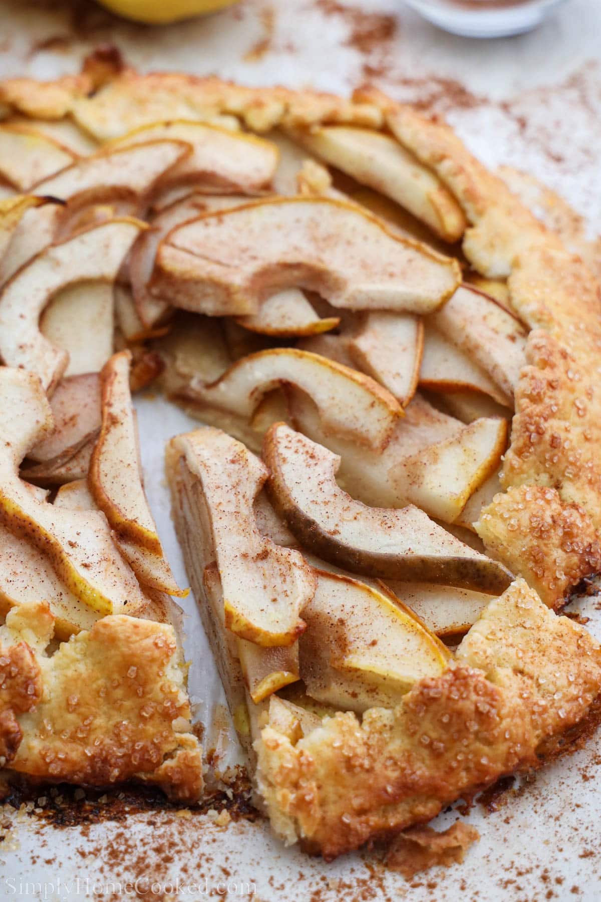 Close up of a Pear Galette with a slice cut out.