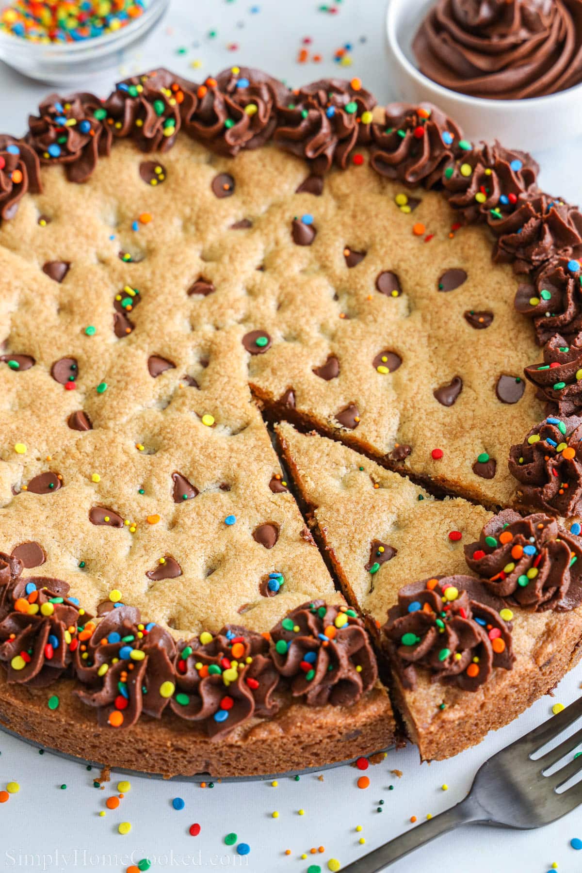 Cookie Cake with a slice cut out.