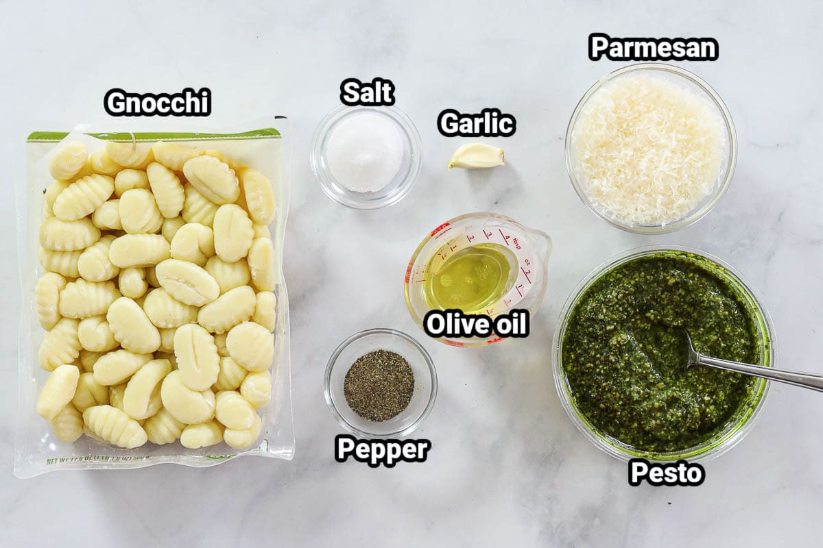 Ingredients for Pesto Gnocchi: gnocchi, parmesan, pesto, garlic, olive oil, salt, and pepper.