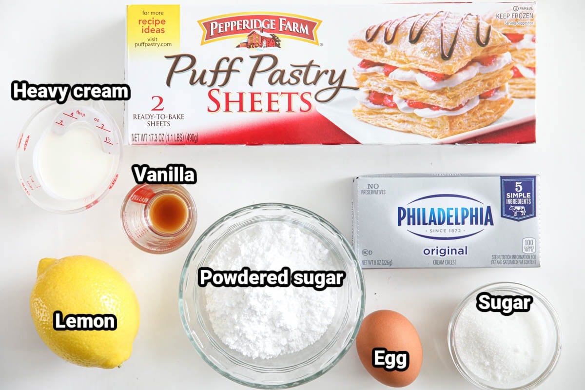 Ingredients in a Cream Cheese Danish: puff pastry sheets, heavy cream, cream cheese, vanilla extract, powdered sugar, lemon, egg, and sugar. 