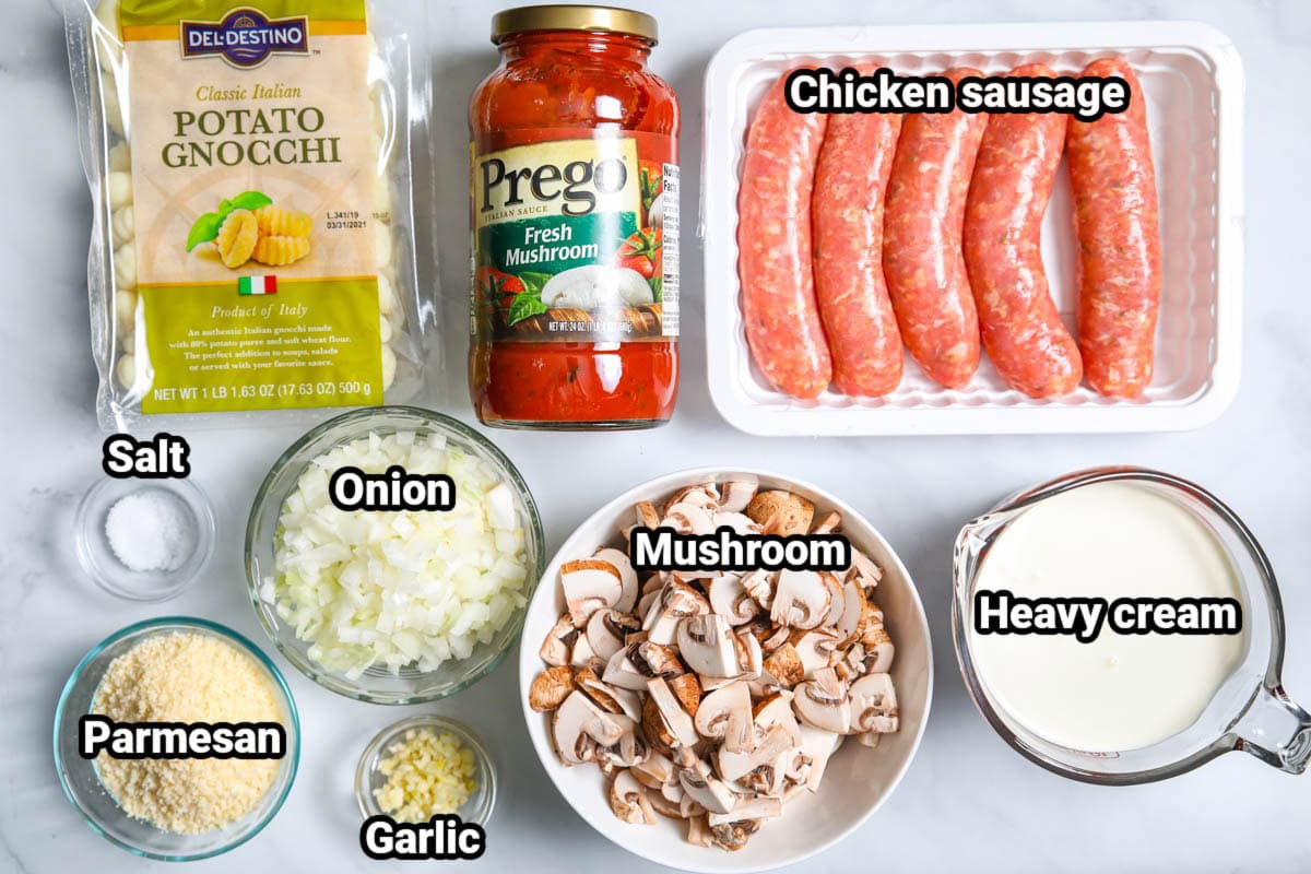 Ingredients for Creamy Sausage Gnocchi: potato gnocchi, mushroom tomato sauce, chicken sausage, heavy cream, onion, garlic, salt, mushrooms, and parmesan cheese.