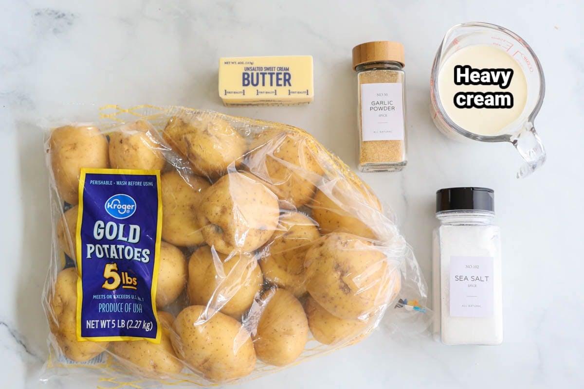 Ingredients for Yukon Gold Mashed Potatoes: Yukon gold potatoes, butter, heavy cream, sea salt, and garlic powder.