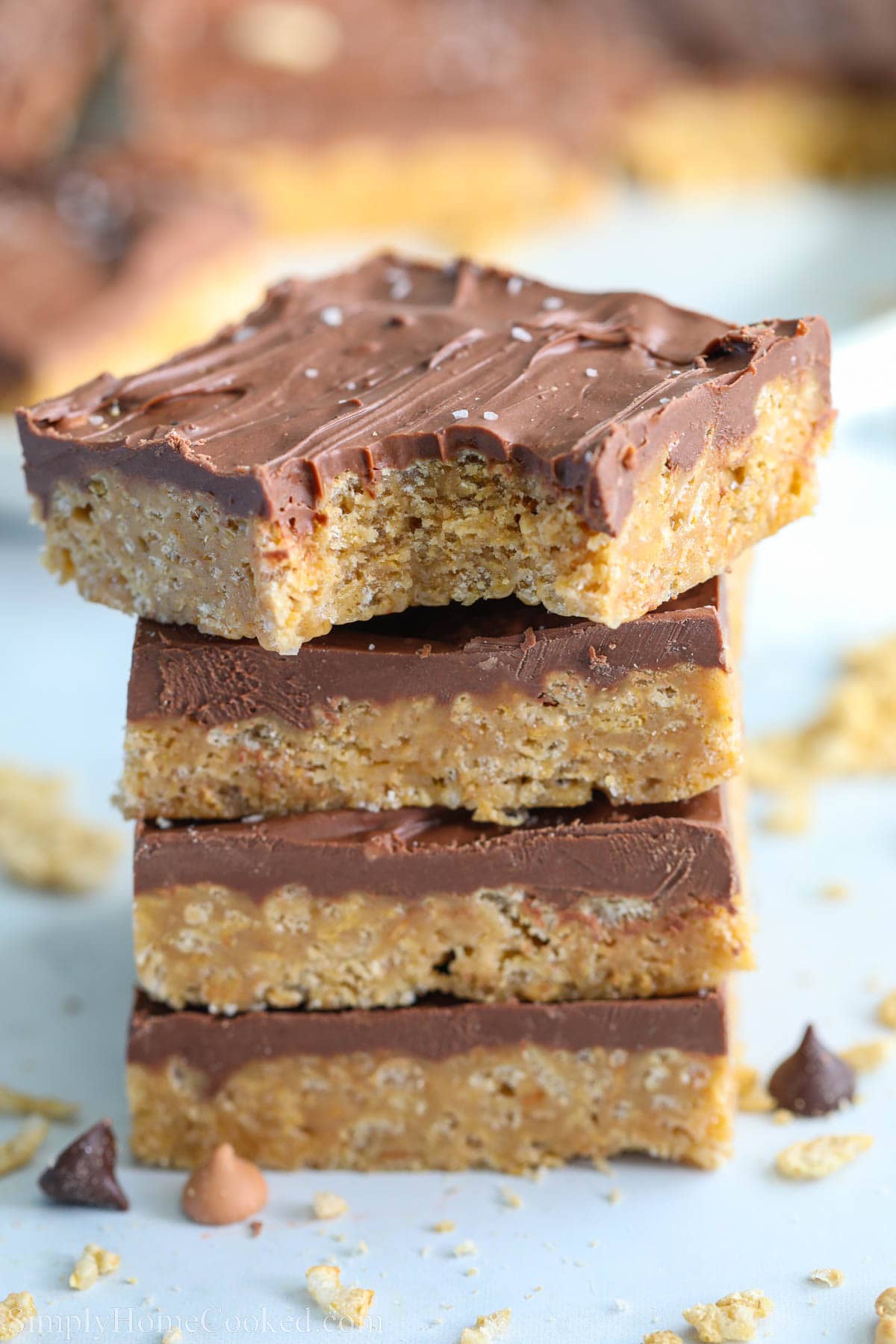 Stack of Chewy Special K Bars, the top one missing a bite. 