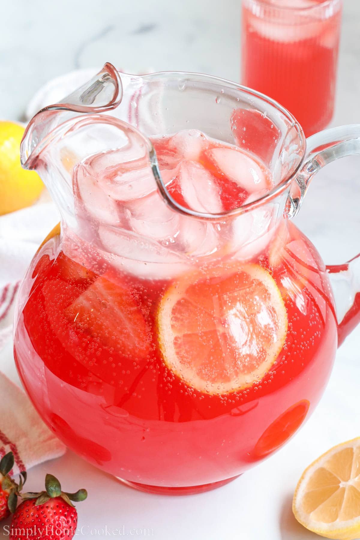 Sparkling Fruit Punch in a pitcher with ice.