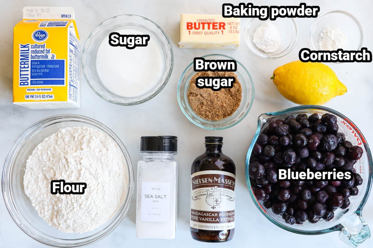 Ingredients for Blueberry Cobbler: blueberries, lemon, cornstarch, baking powder, butter, brown sugar, vanilla extract, sea salt, sugar, flour, and buttermilk.