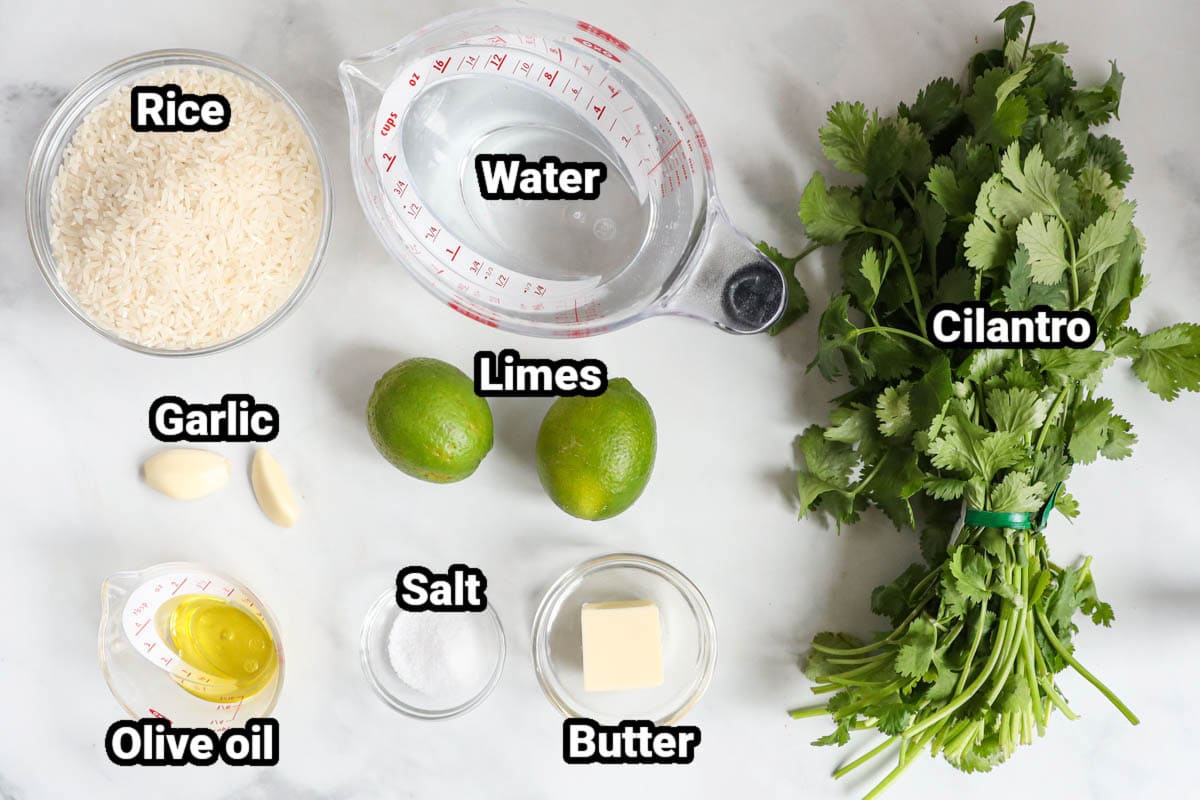 Ingredients for Cilantro Lime Rice: rice, water, garlic, limes, olive oil, salt, butter, and cilantro.
