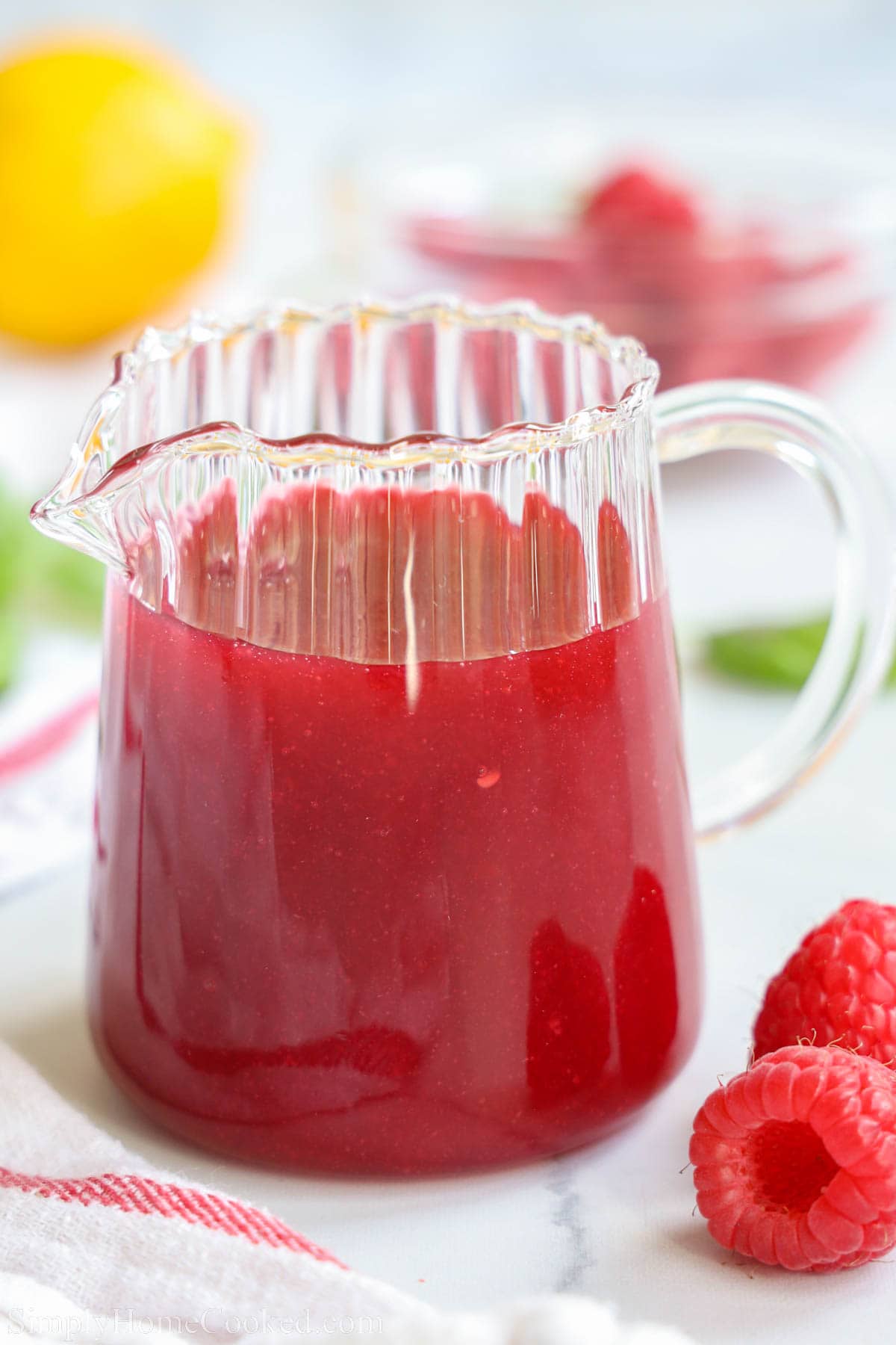 A pitcher of Raspberry Coulis.