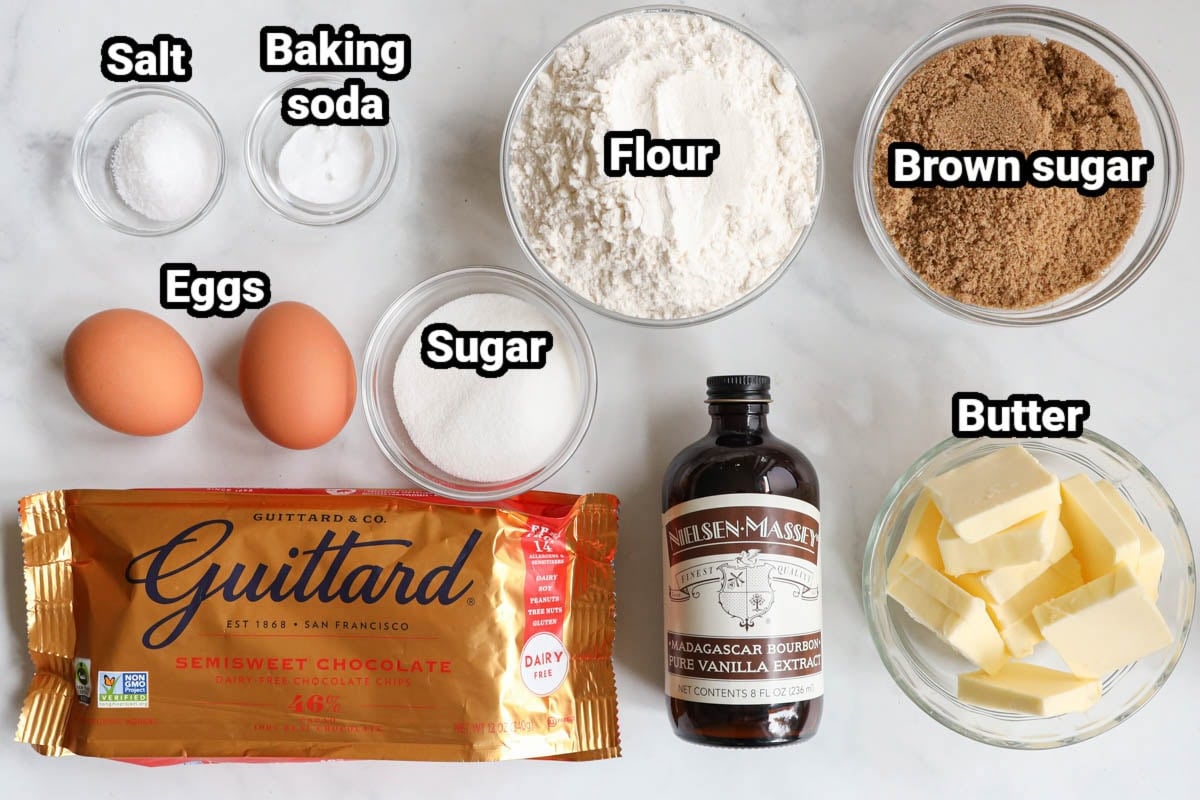 Ingredients for Brown Butter Chocolate Chip Cookies: flour, brown sugar, white sugar, baking soda, salt, eggs, semisweet chocolate chips, butter, and vanilla.